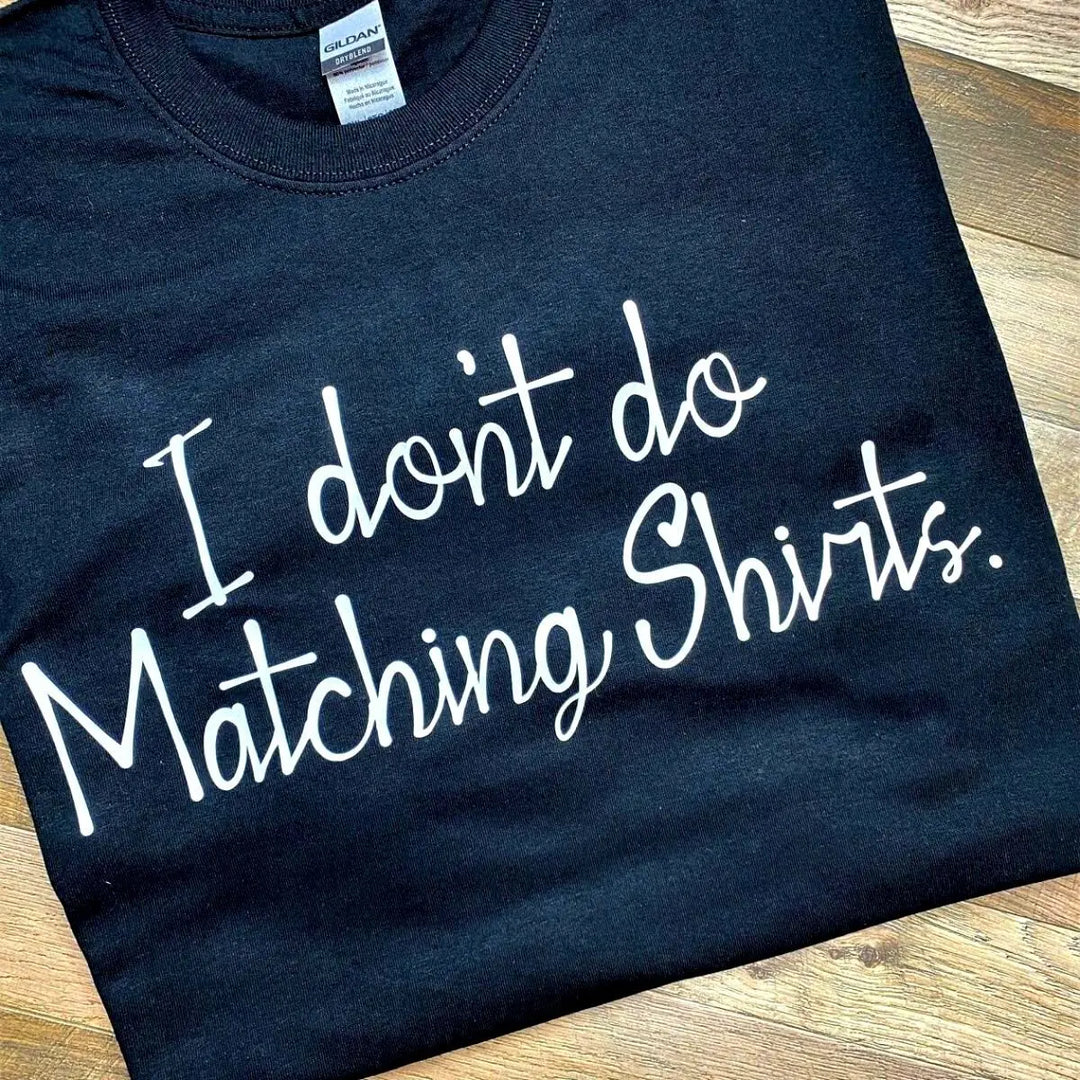 Couples' black T-shirt set: His says 'I don't do Matching Shirts.' Hers replies with 'But I do...'—a playful, stylish duo look for couples who match in love, not just in outfits. From CouplesChoices.com.