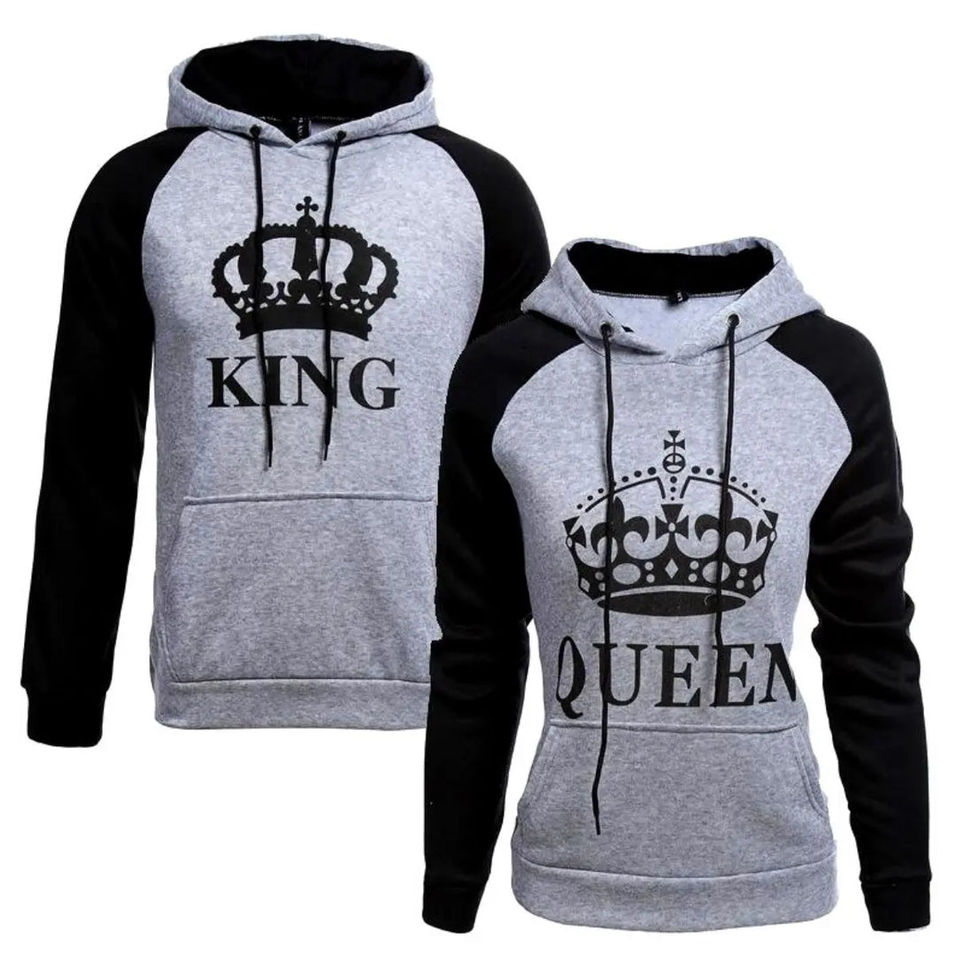 Matching heather gray and black couple hoodies from CouplesChoices.com featuring bold black “KING” and “QUEEN” lettering with royal crown graphics. A sleek and modern set designed for couples who wear their love with confidence and class.