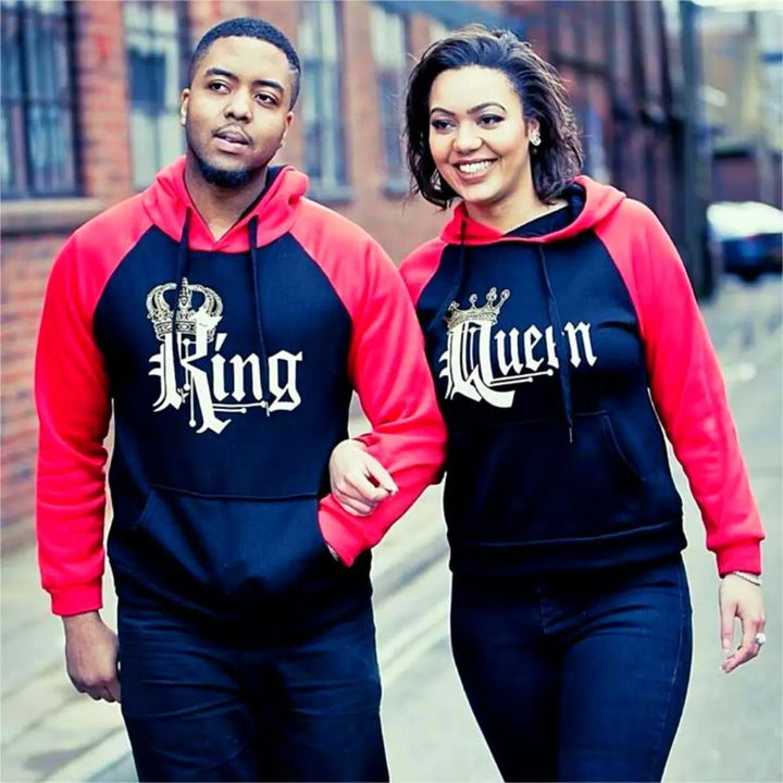 Matching red and black couple hoodies from CouplesChoices.com featuring bold gothic “King” and “Queen” lettering with gold crown graphics. A regal and romantic streetwear set designed for couples who rule in love and confidence.