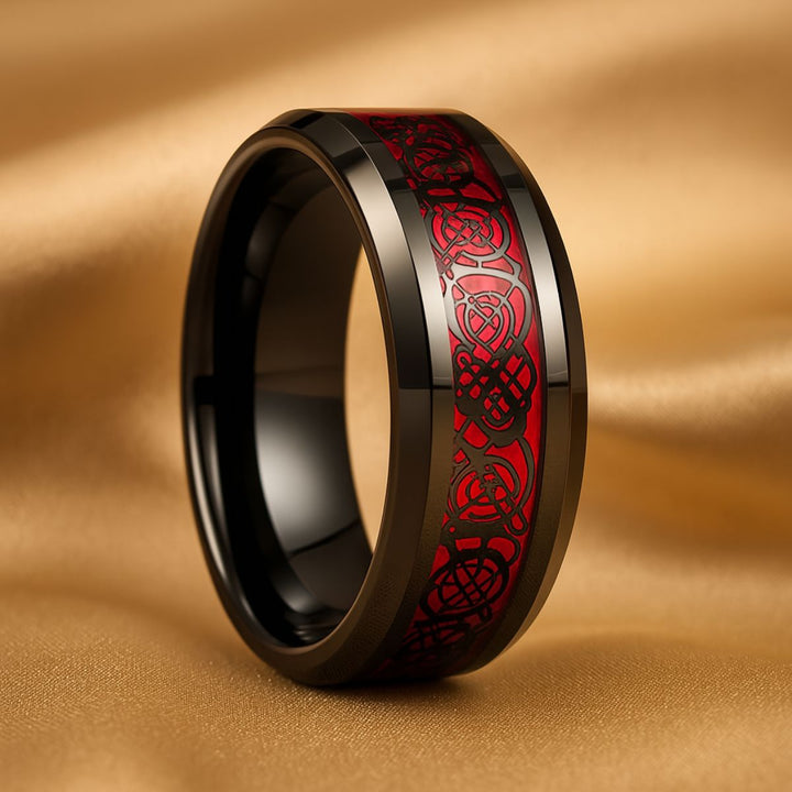 Bold and elegant Red Velvet ring set from CouplesChoices.com, crafted in black titanium with a marquise-cut red center stone, pavé accents, and a red Celtic infinity inlay symbolizing eternal passion.