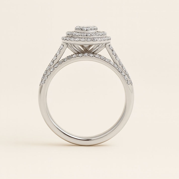 CouplesChoices.com Infinity Rings – A dazzling bridal set with a heart-shaped diamond cluster and pavé halos, paired with a men’s polished band inlaid with channel-set diamonds. A timeless expression of infinite love and luxury.