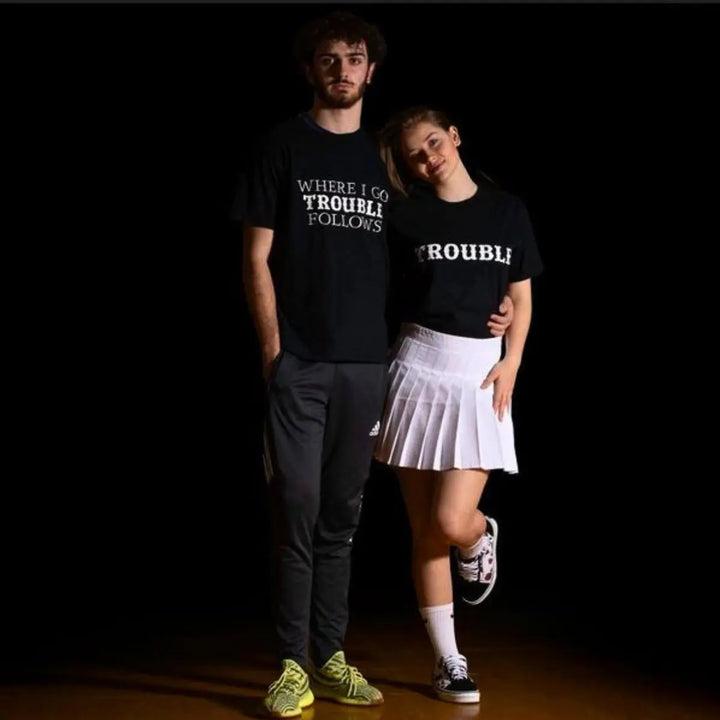 Couples black matching shirts from CouplesChoices.com—one reads “WHERE I GO TROUBLE FOLLOWS,” the other simply says “TROUBLE.” A cheeky, confident way to show playful love and unforgettable chemistry.