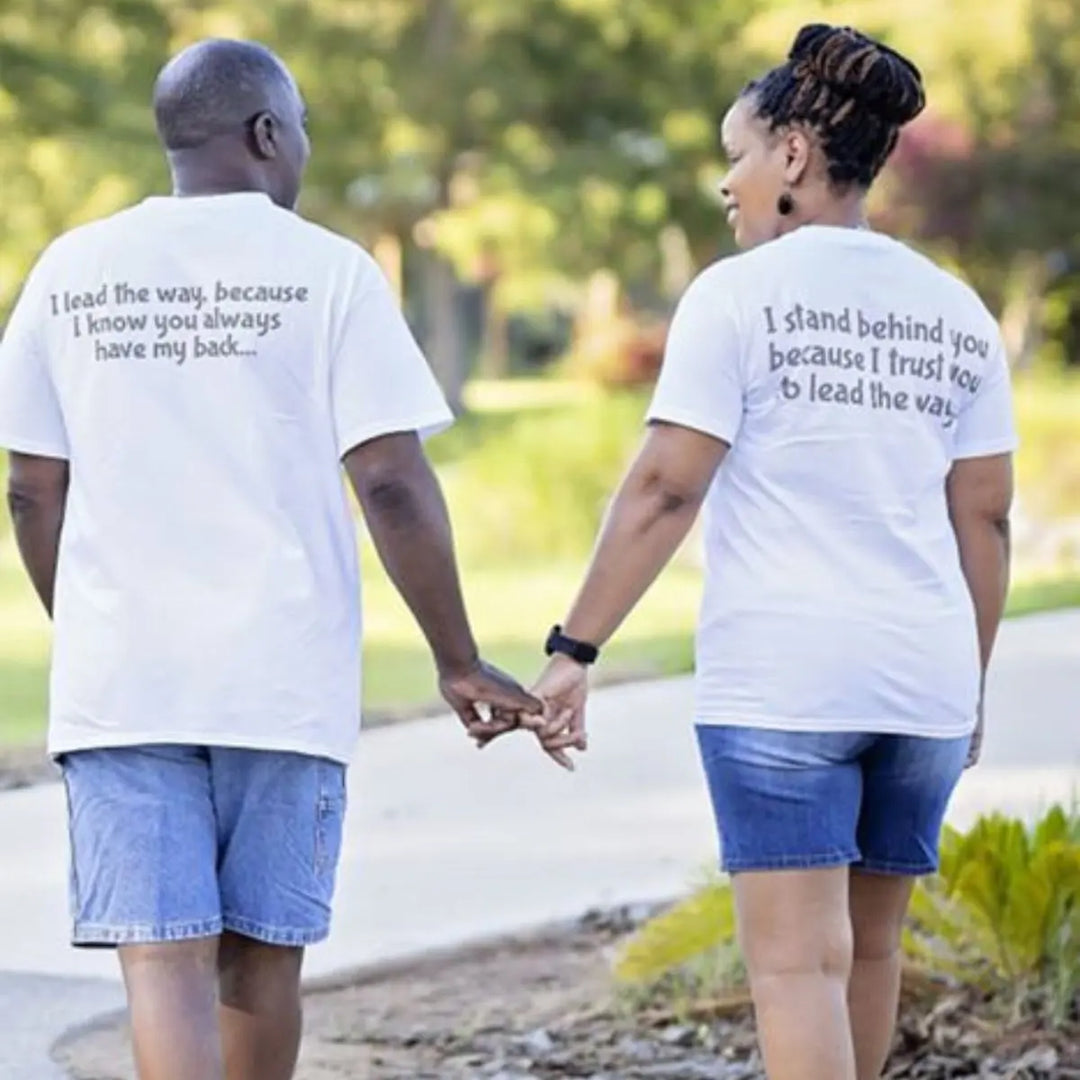 Couples matching tees from CouplesChoices.com—his says “I lead the way, because I know you always have my back,” hers reads “I stand behind you because I trust you to lead the way.” A powerful symbol of trust, love, and teamwork.