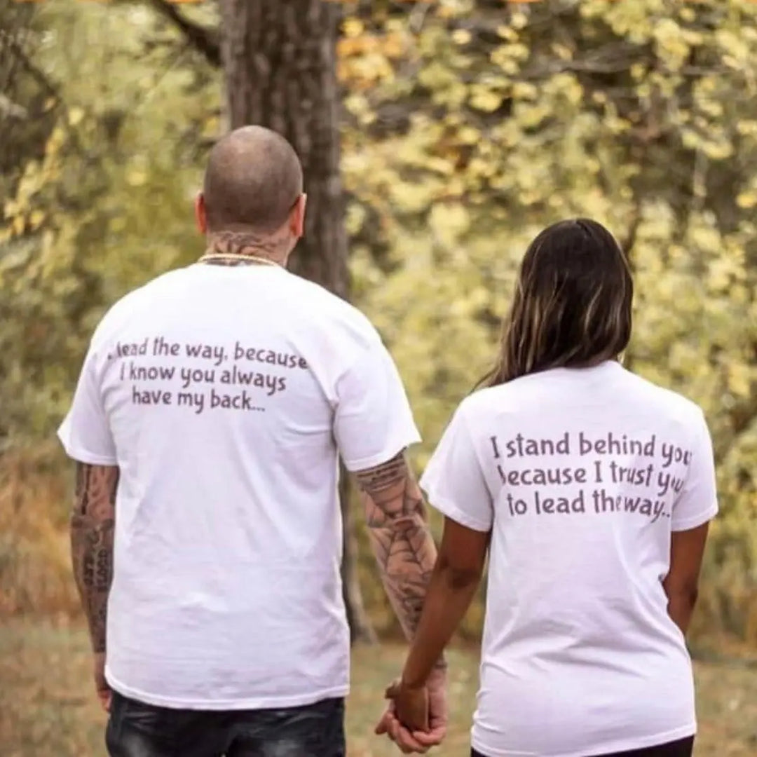 Couples matching tees from CouplesChoices.com—his says “I lead the way, because I know you always have my back,” hers reads “I stand behind you because I trust you to lead the way.” A powerful symbol of trust, love, and teamwork.