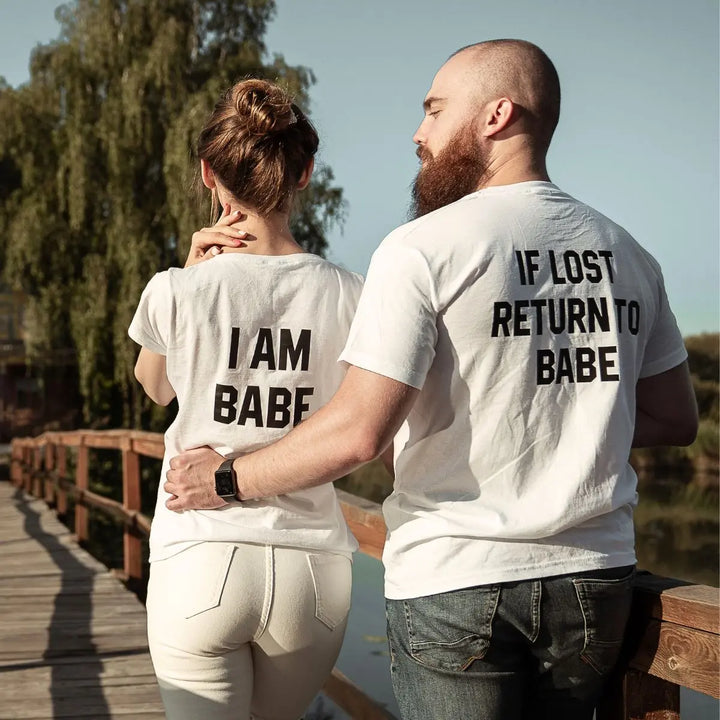 Couples matching white T-shirts from CouplesChoices.com—his says “If Lost Return to Babe,” hers says “I Am Babe.” A fun, romantic way to express loyalty, love, and playful devotion in a relationship.