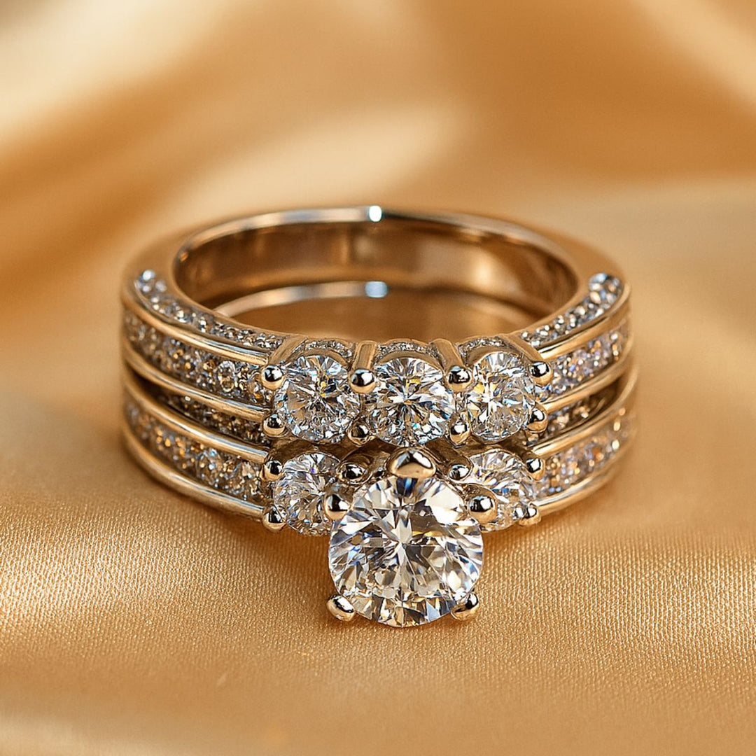 Elegant Hearted Love Rings by CouplesChoices.com, featuring a heart-shaped diamond centerpiece, triple-band pavé setting, and a matching diamond eternity men's band – luxury crafted for timeless commitment and bold style.
