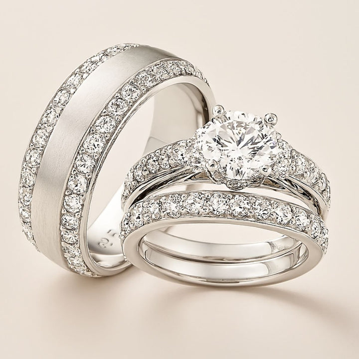 Elegant sterling silver bridal set with flawless pavé-set diamonds and a brilliant round solitaire centerpiece. Timeless in design and luminous in craftsmanship—Ever Rings by CouplesChoices.com defines forever.