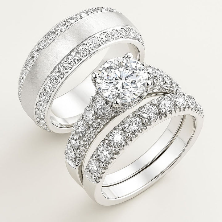 Elegant sterling silver bridal set with flawless pavé-set diamonds and a brilliant round solitaire centerpiece. Timeless in design and luminous in craftsmanship—Ever Rings by CouplesChoices.com defines forever.