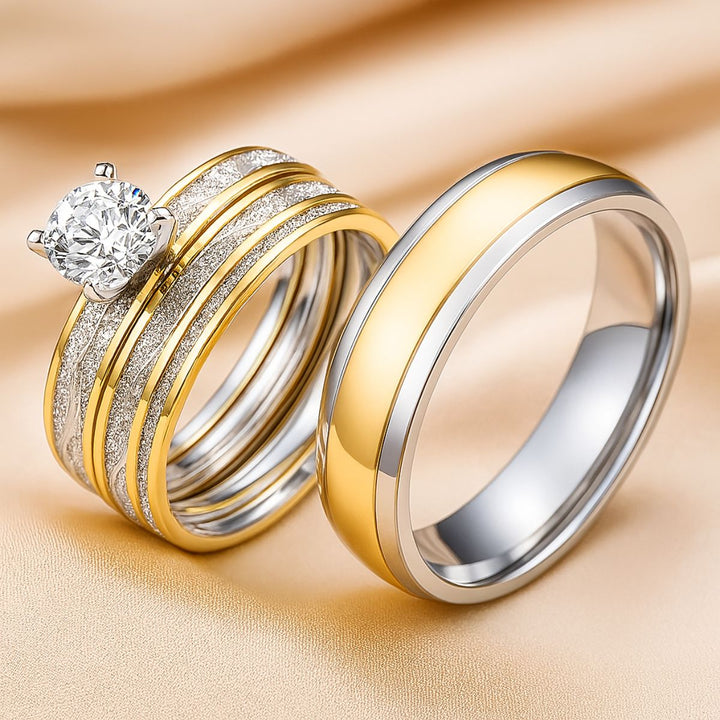 Fall in Love Rings by CouplesChoices.com—featuring a stunning round-cut solitaire and matching bands in silver and gold with textured wave accents. A radiant fusion of elegance and warmth, capturing the golden glow of timeless love.