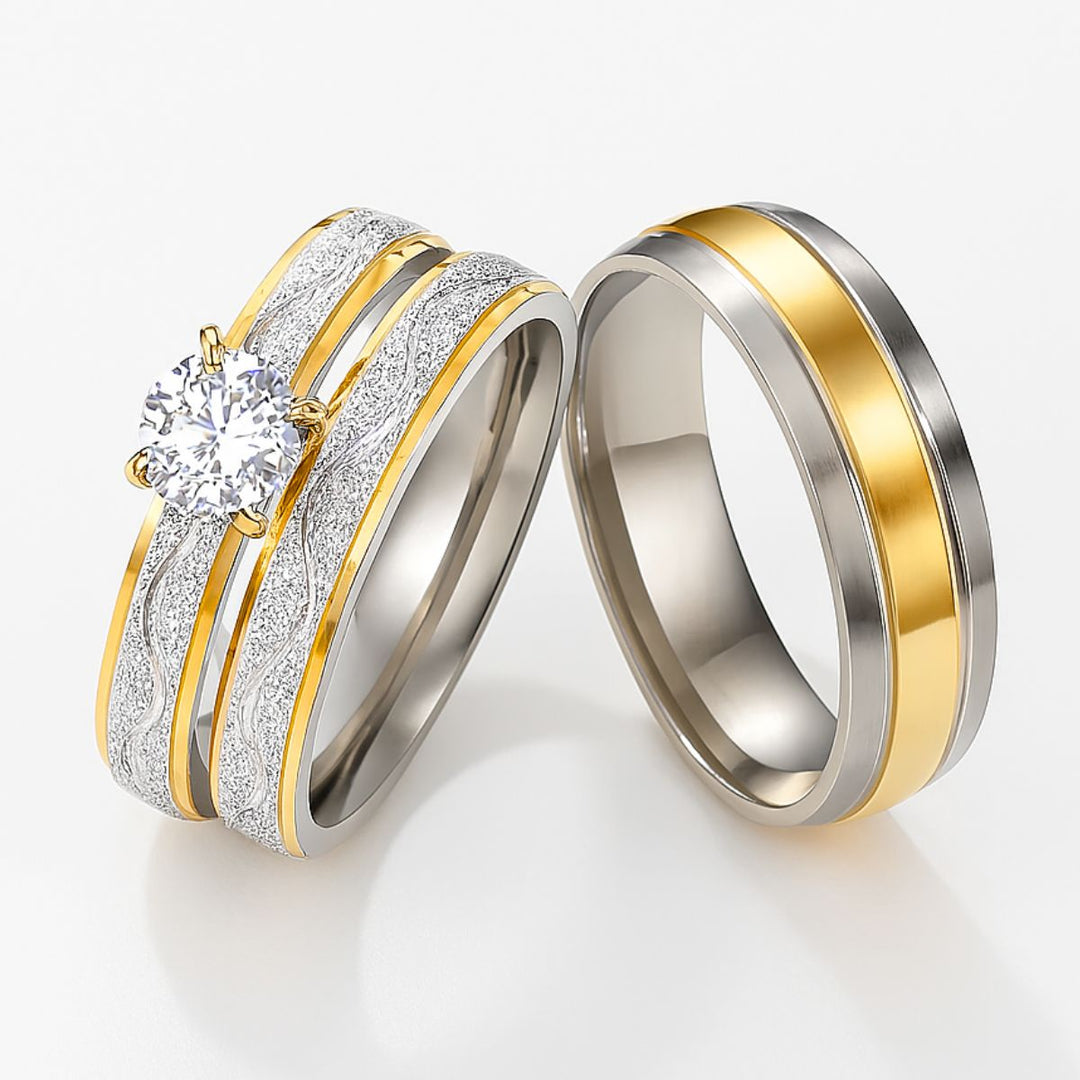 Fall in Love Rings by CouplesChoices.com—featuring a stunning round-cut solitaire and matching bands in silver and gold with textured wave accents. A radiant fusion of elegance and warmth, capturing the golden glow of timeless love.