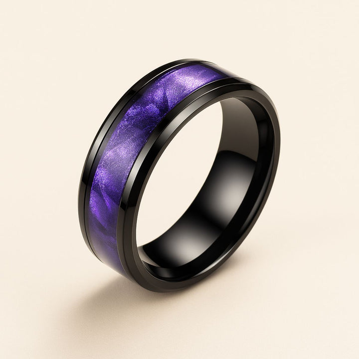 Fidelity Ring Set by CouplesChoices.com — featuring a radiant heart-shaped purple gemstone in sleek black gold with pavé violet accents, paired with a bold men’s band with a vibrant deep-amethyst inlay. A daring union of elegance.