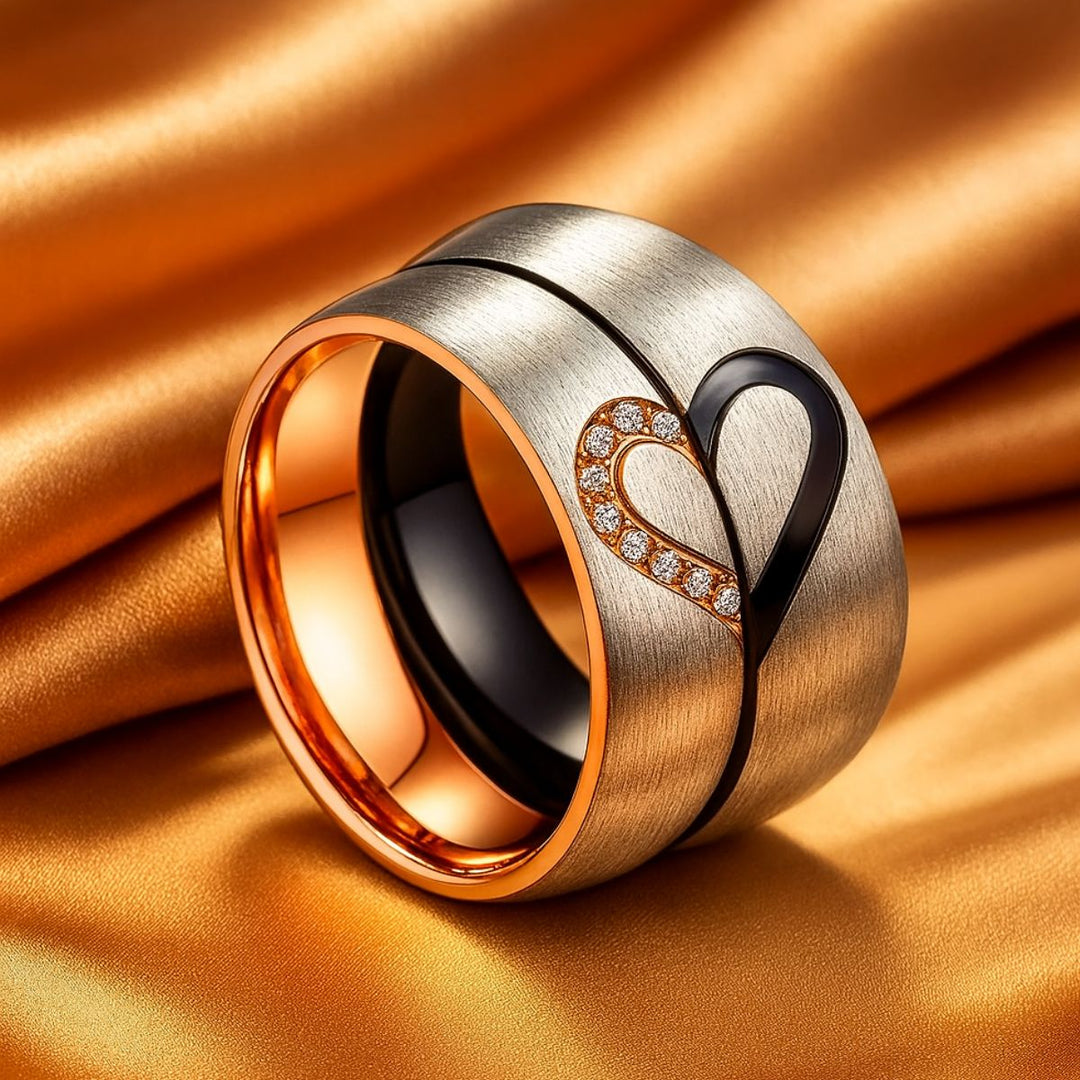 Forever in my Heart Rings by CouplesChoices.com – brushed silver matching couple rings with rose gold interior, forming a heart when placed together. One ring features sparkling cubic zirconia stones, symbolizing unity and eternal love.