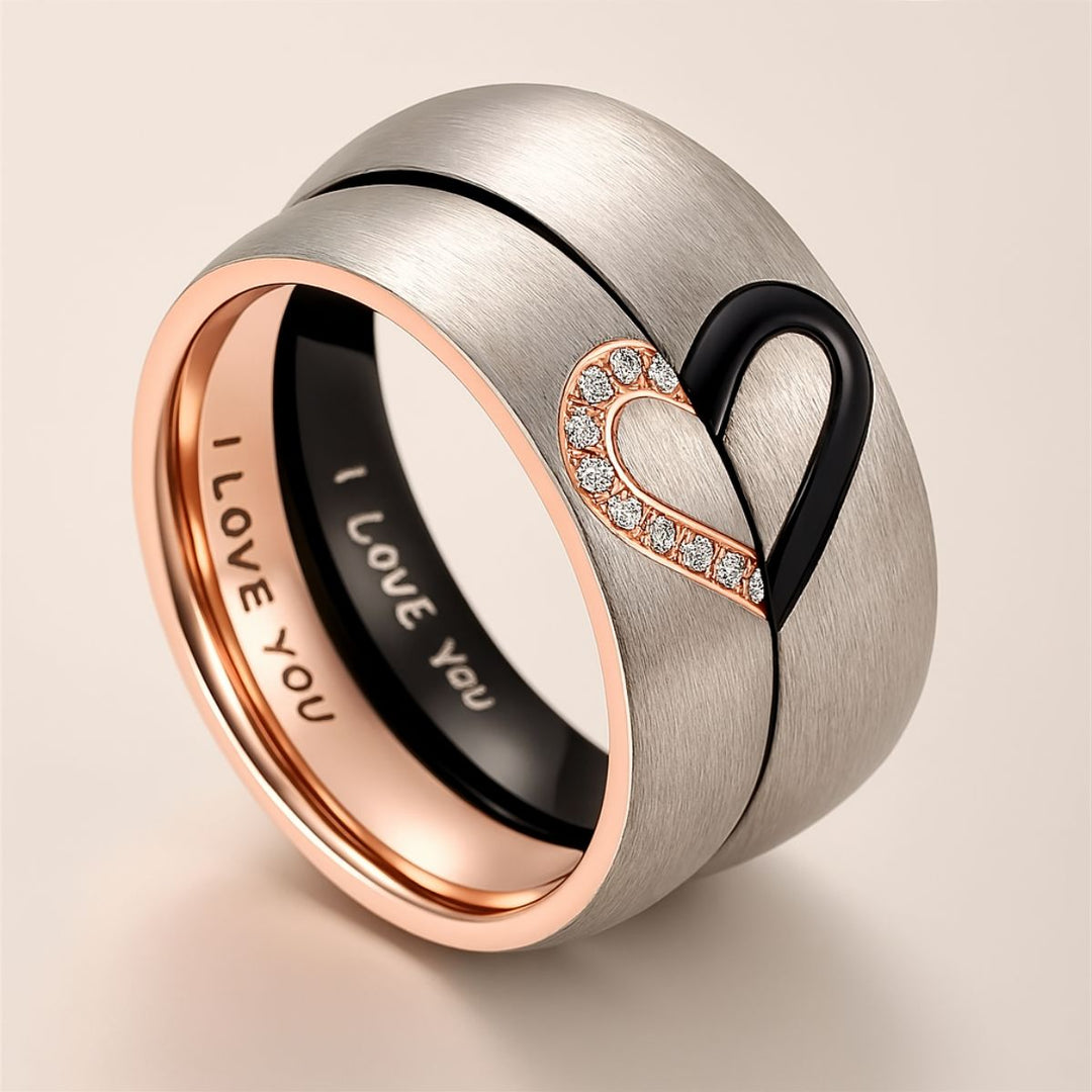 Forever in my Heart Rings by CouplesChoices.com – brushed silver matching couple rings with rose gold interior, forming a heart when placed together. One ring features sparkling cubic zirconia stones, symbolizing unity and eternal love.