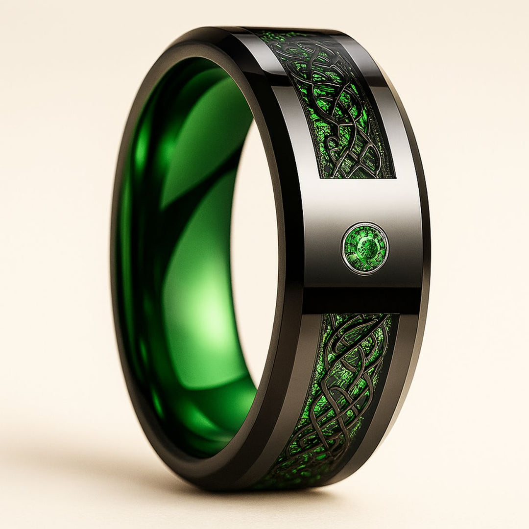 Green Grass Rings by CouplesChoices.com—bold black bands with radiant emerald inlays and Celtic-inspired patterns, symbolizing growth, loyalty, and eternal love in nature’s most vibrant hue.