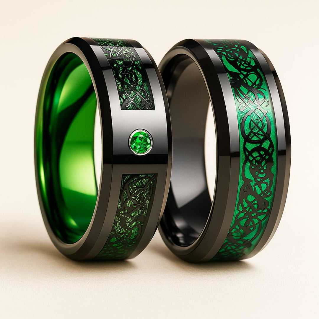 Green Grass Rings by CouplesChoices.com—bold black bands with radiant emerald inlays and Celtic-inspired patterns, symbolizing growth, loyalty, and eternal love in nature’s most vibrant hue.