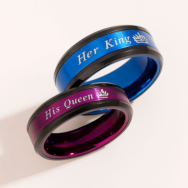 Love Blossom Rings by CouplesChoices.com—vivid titanium bands in electric blue and royal magenta, engraved with “Her King” and “His Queen.” A bold, vibrant tribute to passionate love and colorful devotion that knows no boundaries.