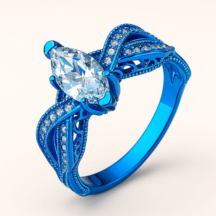 Love Lagoon rings by CouplesChoices.com—dazzling ocean-blue bands with intricate silver detailing and a marquise-cut crystal centerpiece. A breathtaking blend of artistry and romance, made for couples who love boldly and beautifully.