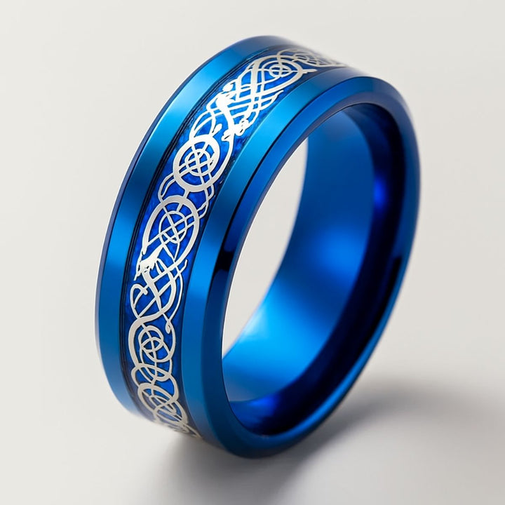 Love Lagoon rings by CouplesChoices.com—dazzling ocean-blue bands with intricate silver detailing and a marquise-cut crystal centerpiece. A breathtaking blend of artistry and romance, made for couples who love boldly and beautifully.