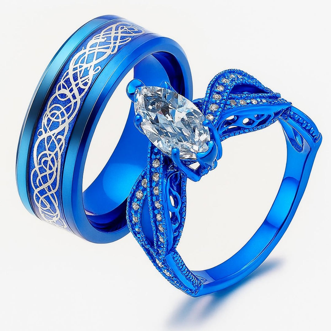 Love Lagoon rings by CouplesChoices.com—dazzling ocean-blue bands with intricate silver detailing and a marquise-cut crystal centerpiece. A breathtaking blend of artistry and romance, made for couples who love boldly and beautifully.
