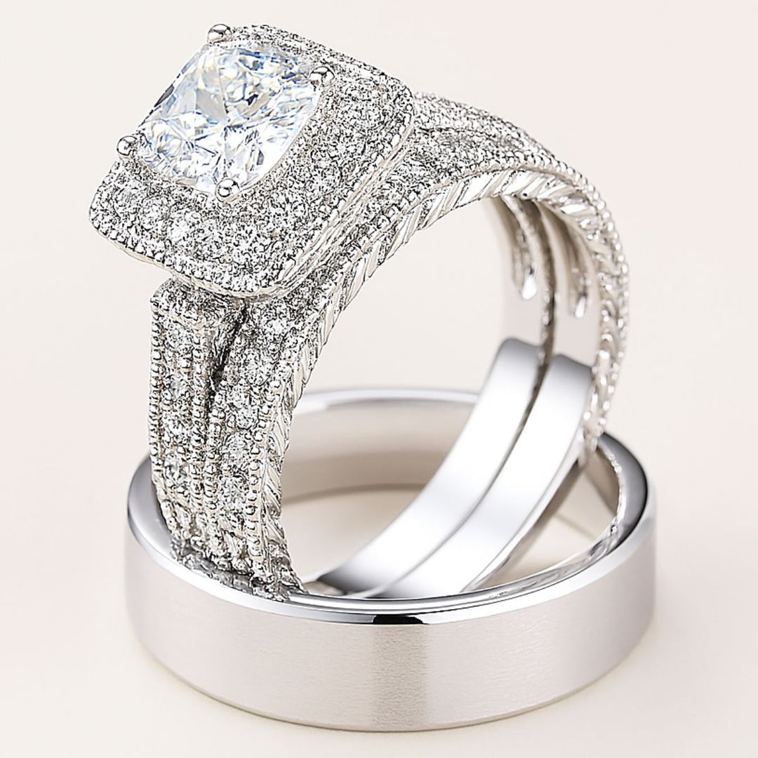 Love Mountain Rings by CouplesChoices.com—an exquisite bridal set with a princess-cut centerpiece framed in pavé brilliance, paired with a bold, brushed band. Designed for enduring love that stands tall, timeless, and unshakable.
