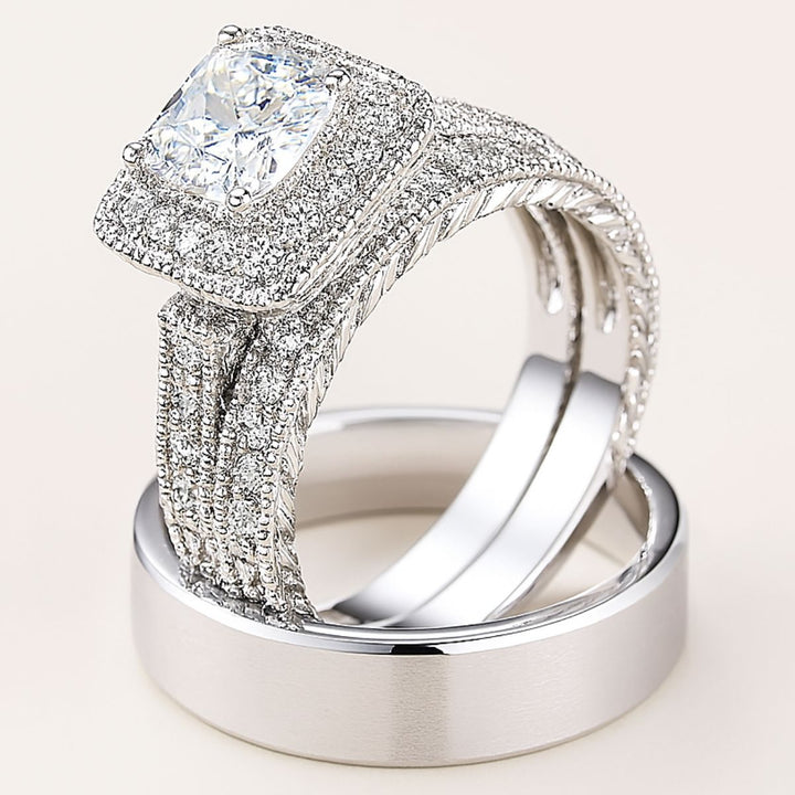 Love Mountain Rings by CouplesChoices.com—an exquisite bridal set with a princess-cut centerpiece framed in pavé brilliance, paired with a bold, brushed band. Designed for enduring love that stands tall, timeless, and unshakable.