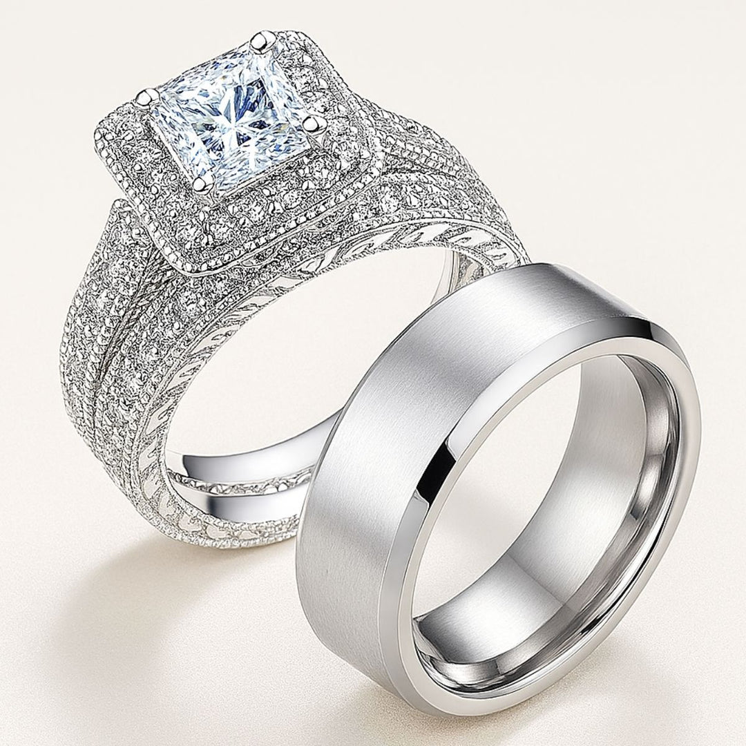 Love Mountain Rings by CouplesChoices.com—an exquisite bridal set with a princess-cut centerpiece framed in pavé brilliance, paired with a bold, brushed band. Designed for enduring love that stands tall, timeless, and unshakable.