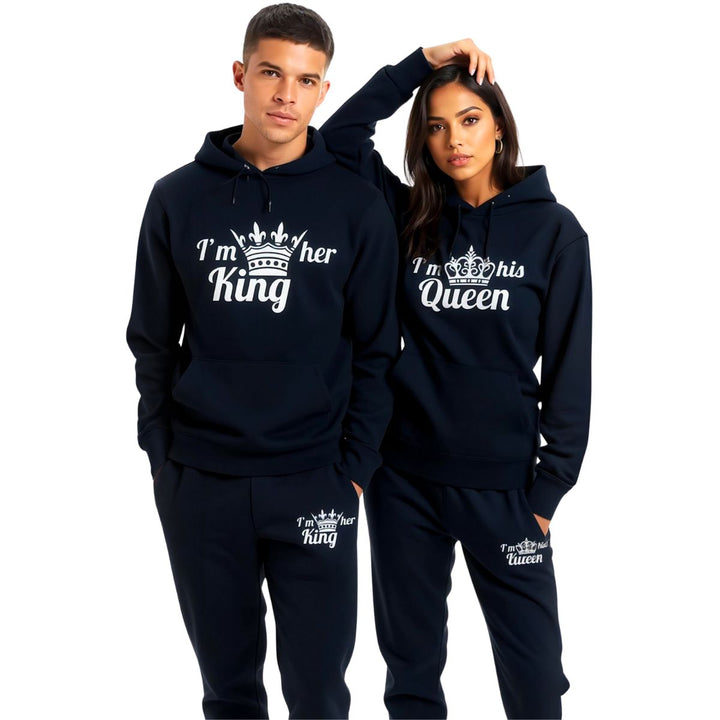 Matching black King and Queen couples tracksuits with white crown prints and bold text reading 'I'm her King' and 'I'm his Queen,' from CouplesChoices.com. Perfect for stylish partners looking to showcase their love.