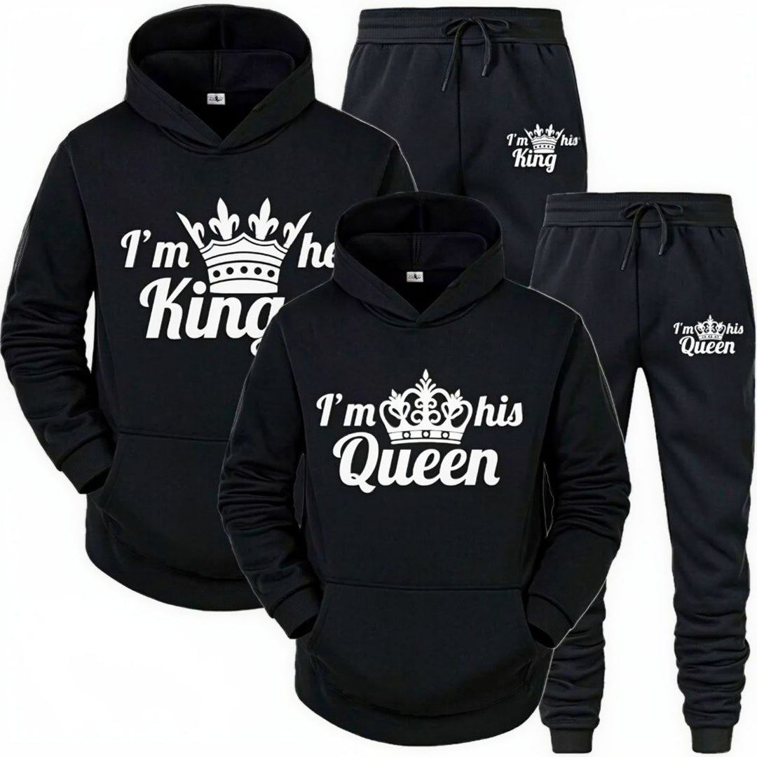 Matching black King and Queen couples tracksuits with white crown prints and bold text reading 'I'm her King' and 'I'm his Queen,' from CouplesChoices.com. Perfect for stylish partners looking to showcase their love.