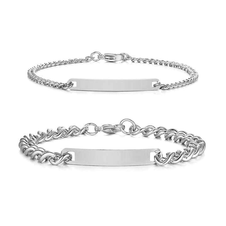 Matching engraved couple bracelets with minimalist chain link design in silver, gold, and black finishes, featuring personalized nameplate tags—romantic gift for couples by CouplesChoices.com.