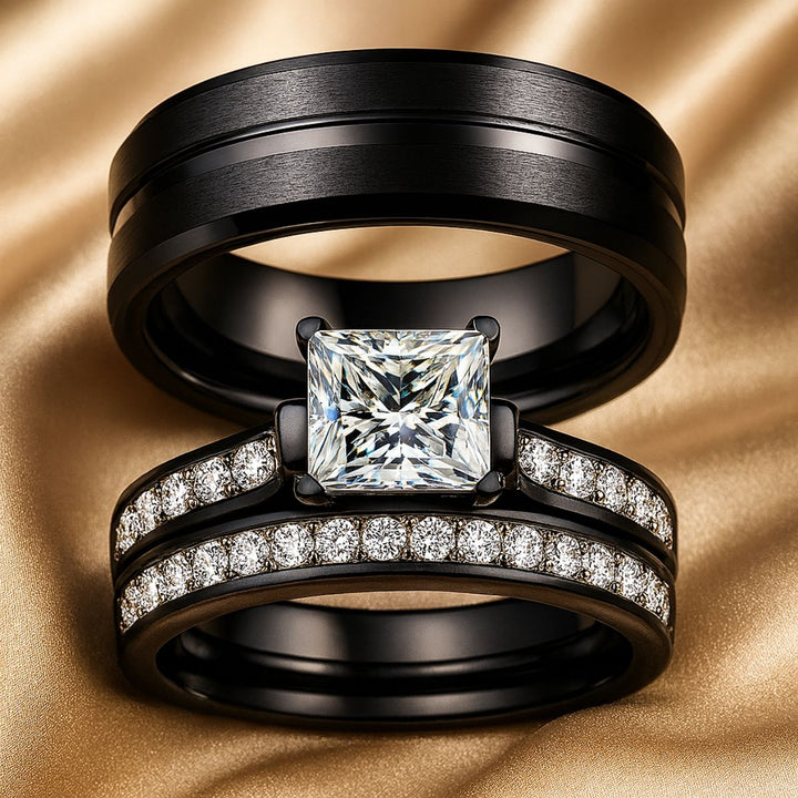 Moonlight Shadow Rings by CouplesChoices.com, featuring a black metal bridal set with a princess-cut center stone and pavé diamond bands, paired with a sleek black tungsten men’s ring.