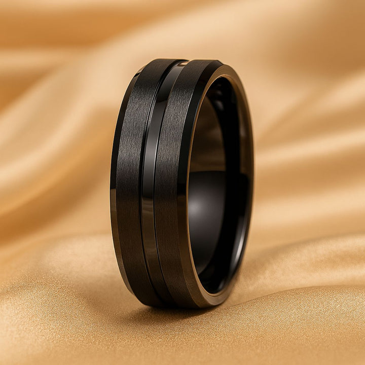 Moonlight Shadow Rings by CouplesChoices.com, featuring a black metal bridal set with a princess-cut center stone and pavé diamond bands, paired with a sleek black tungsten men’s ring.