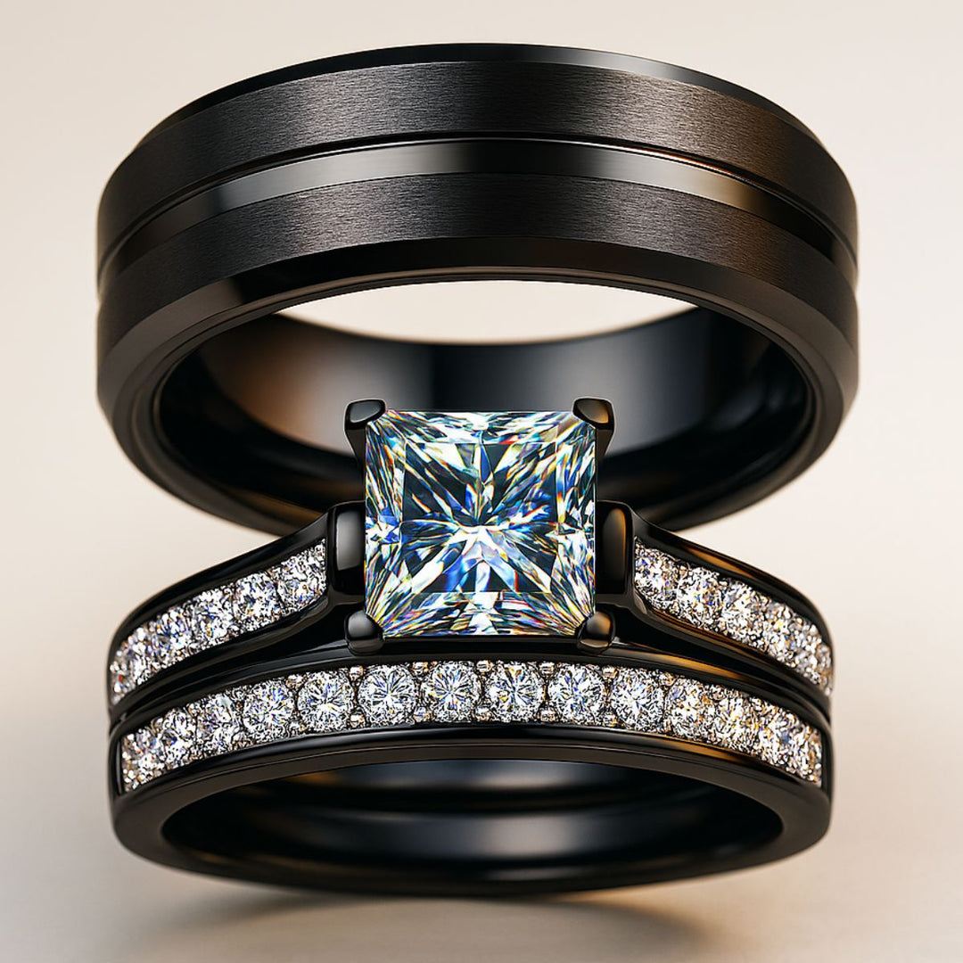 Moonlight Shadow Rings by CouplesChoices.com, featuring a black metal bridal set with a princess-cut center stone and pavé diamond bands, paired with a sleek black tungsten men’s ring.