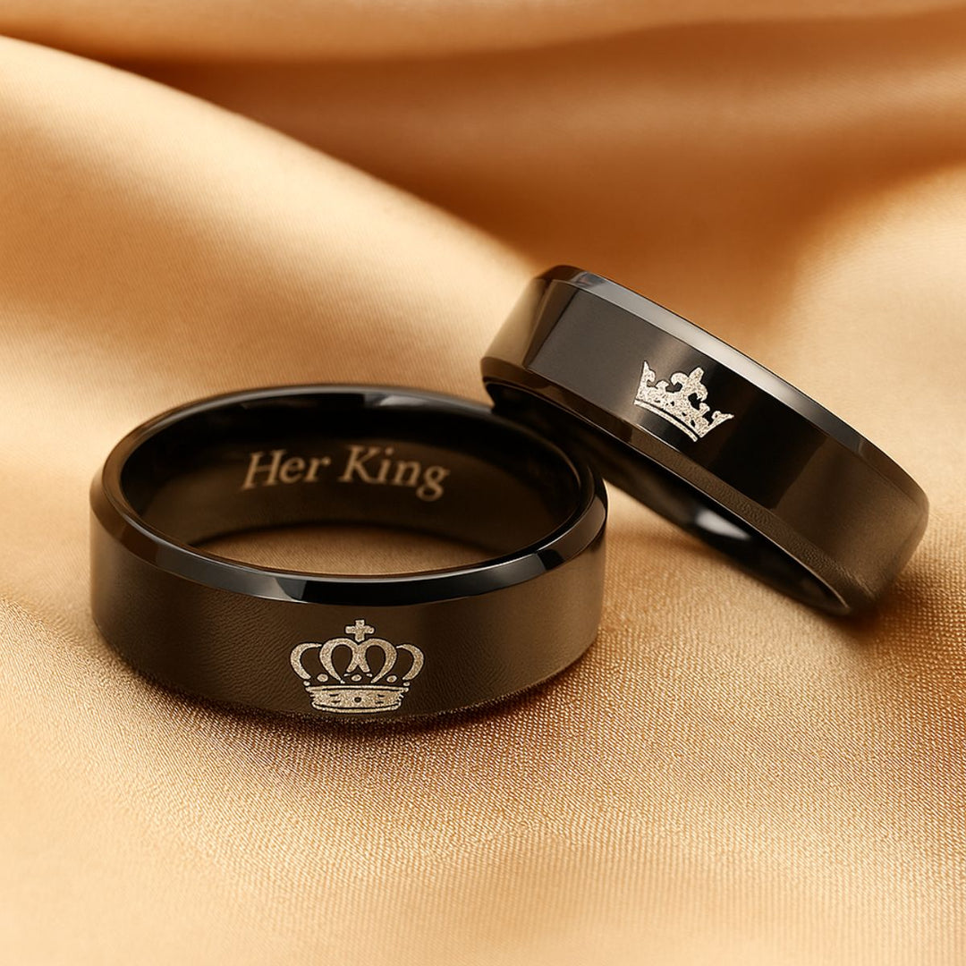 Night Rings by CouplesChoices.com feature polished black bands with regal crown engravings and inner “Her King” & “His Queen” inscriptions—crafted for couples who rule each other’s hearts with unmatched elegance and unwavering connection.