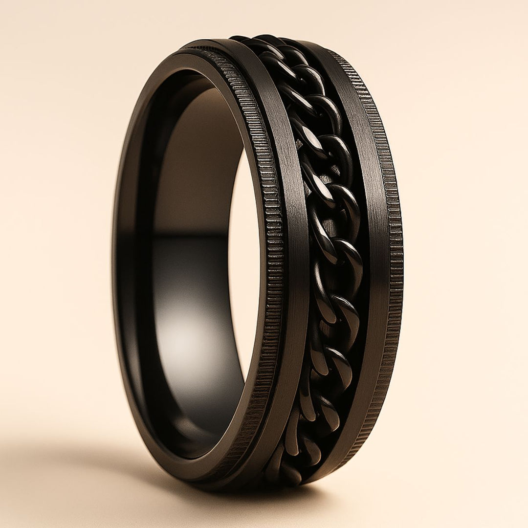 Passion ring set by CouplesChoices.com, featuring a diamond-studded infinity heart with black rope detail and a bold black chain-link men’s band—symbolizing unbreakable, fearless love.