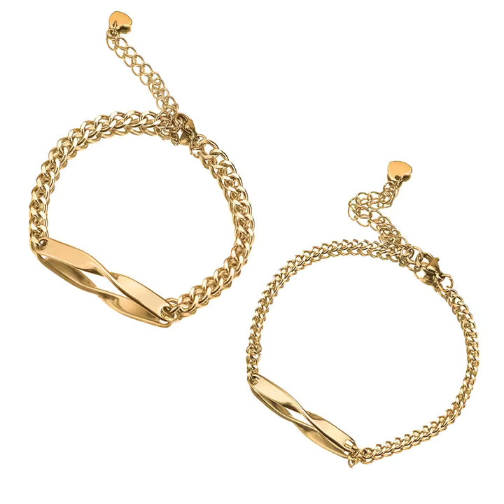 Personalized couples bracelets with twisted engraved nameplates and adjustable chain links, available in silver, gold, and rose gold—romantic matching gift from CouplesChoices.com.