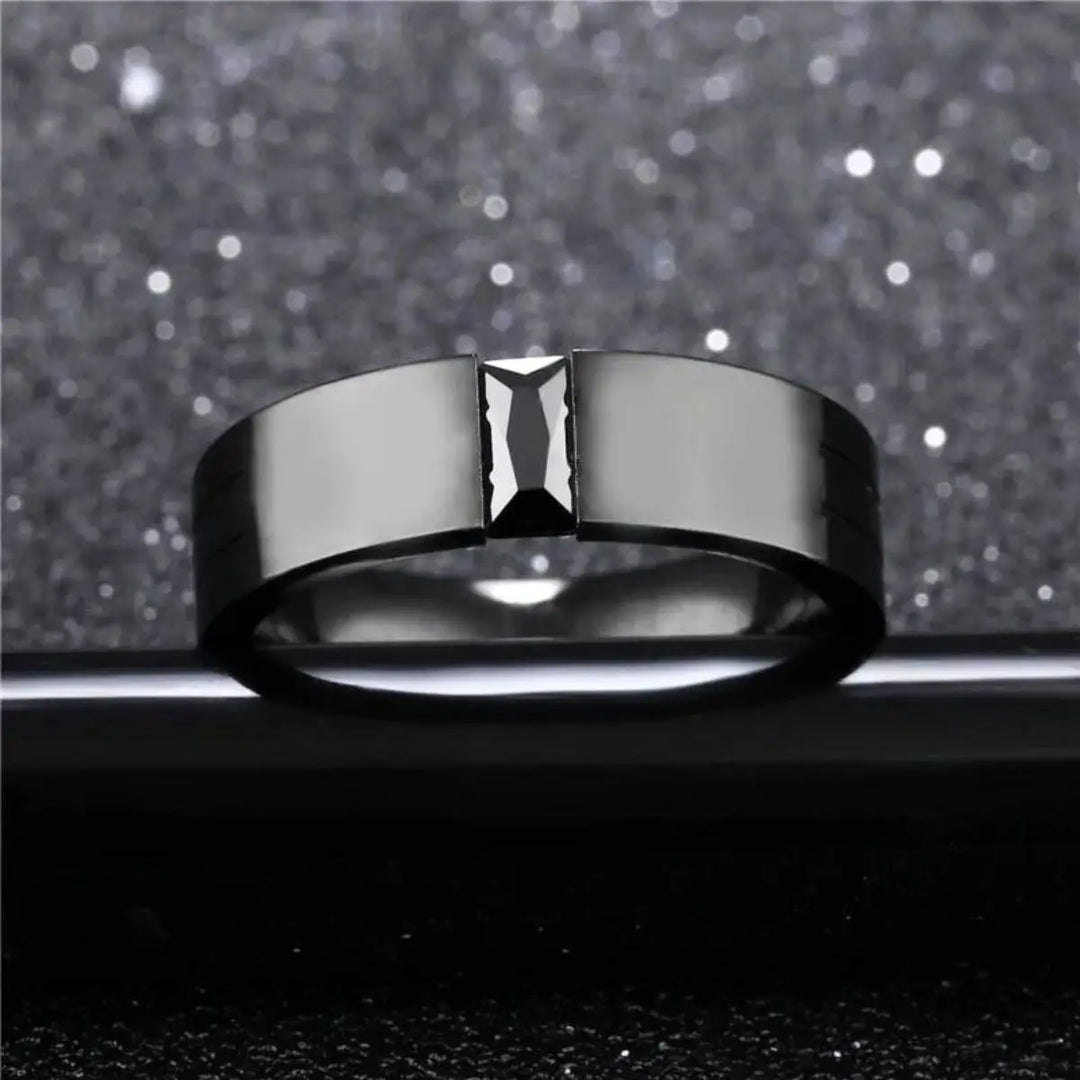 Sleek and bold, the Night Magic Rings from CouplesChoices.com feature a striking black princess-cut stone and matching band, designed for couples who dare to stand out with timeless elegance and powerful unity.