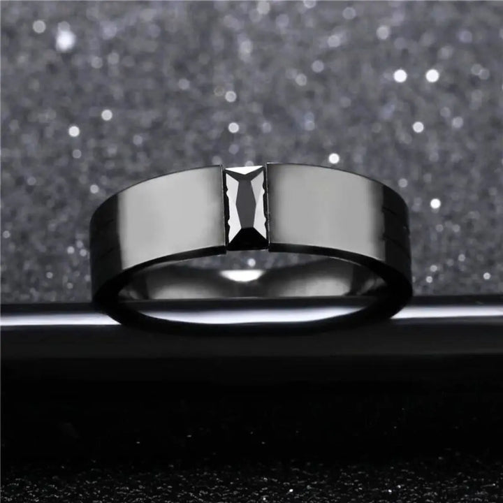 Sleek and bold, the Night Magic Rings from CouplesChoices.com feature a striking black princess-cut stone and matching band, designed for couples who dare to stand out with timeless elegance and powerful unity.