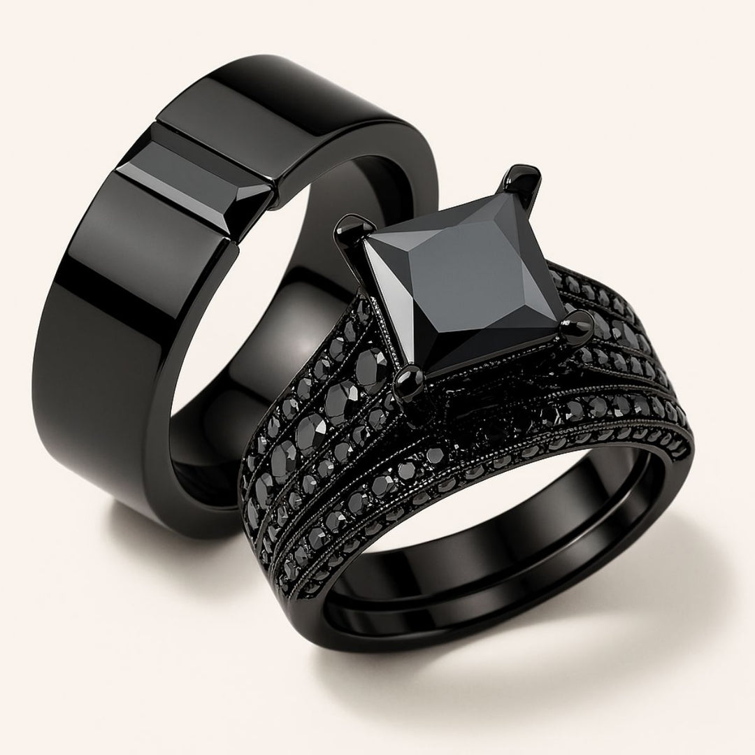 Sleek and bold, the Night Magic Rings from CouplesChoices.com feature a striking black princess-cut stone and matching band, designed for couples who dare to stand out with timeless elegance and powerful unity.