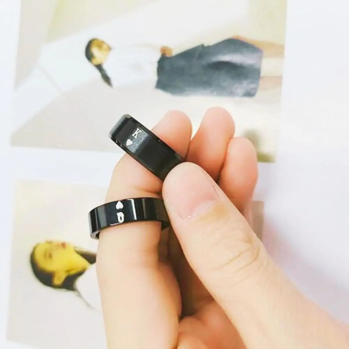 Sleek black Obsession Rings by CouplesChoices.com featuring engraved King and Queen of Hearts symbols—perfectly paired for modern lovers who rule each other’s world.