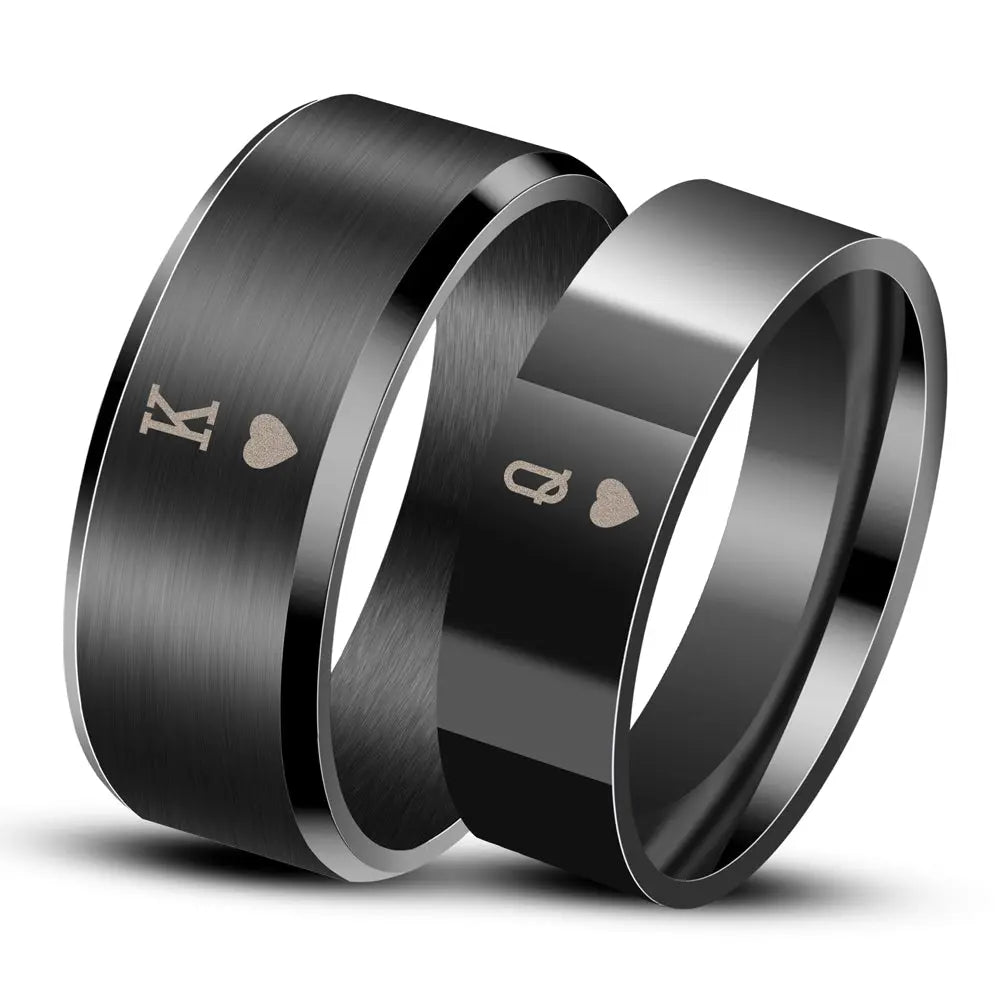 Sleek black Obsession Rings by CouplesChoices.com featuring engraved King and Queen of Hearts symbols—perfectly paired for modern lovers who rule each other’s world.
