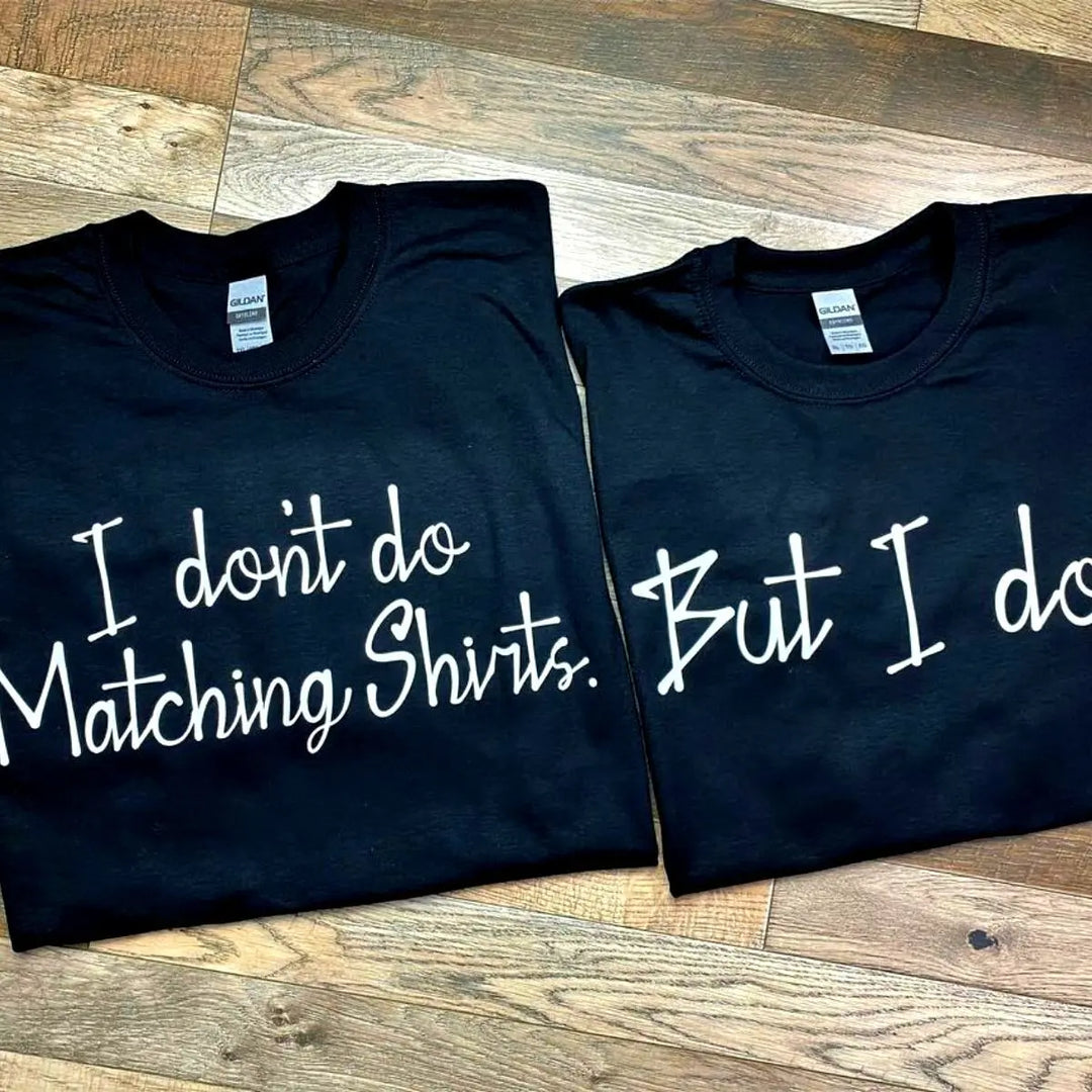 Couples' black T-shirt set: His says 'I don't do Matching Shirts.' Hers replies with 'But I do...'—a playful, stylish duo look for couples who match in love, not just in outfits. From CouplesChoices.com.