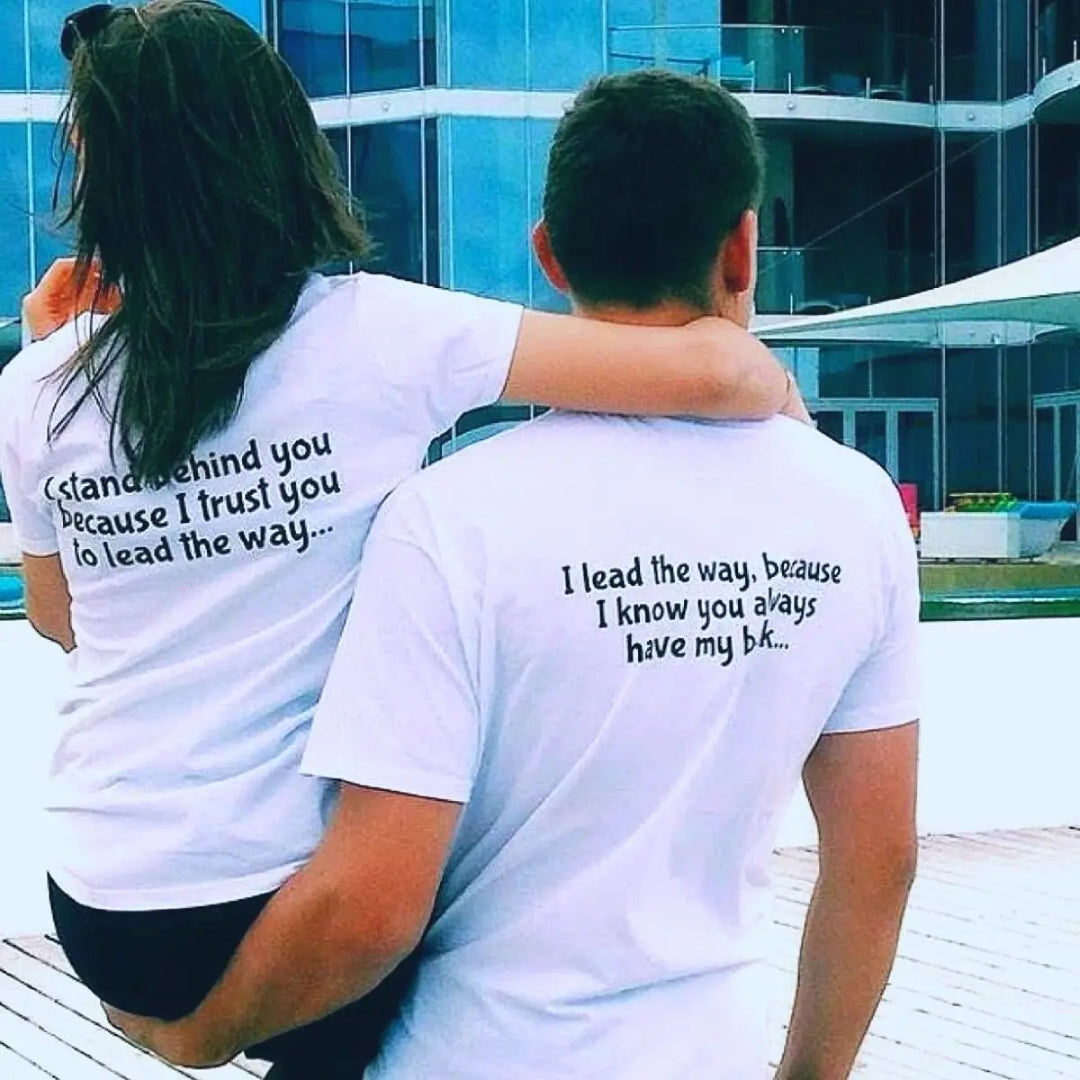 Couples matching tees from CouplesChoices.com—his says “I lead the way, because I know you always have my back,” hers reads “I stand behind you because I trust you to lead the way.” A powerful symbol of trust, love, and teamwork.
