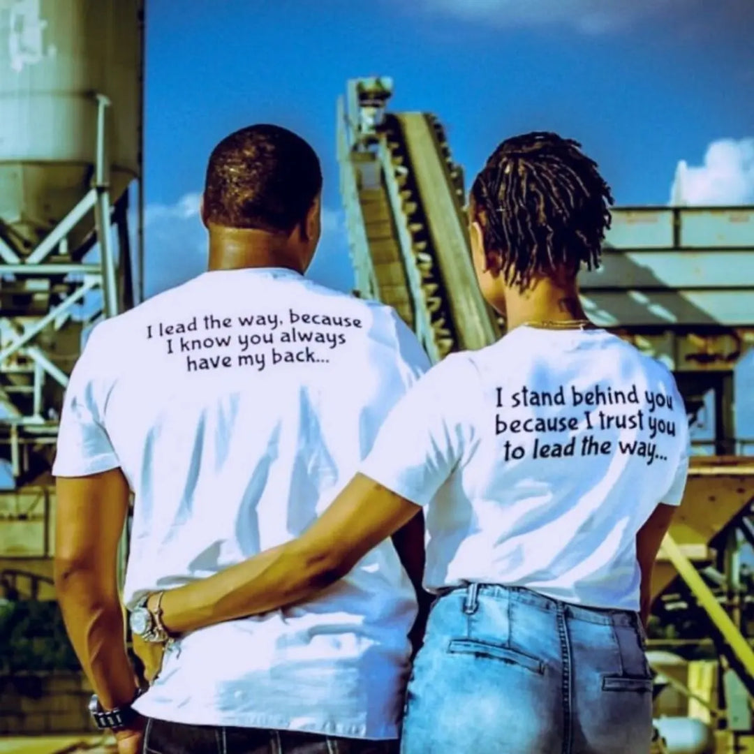 Couples matching tees from CouplesChoices.com—his says “I lead the way, because I know you always have my back,” hers reads “I stand behind you because I trust you to lead the way.” A powerful symbol of trust, love, and teamwork.