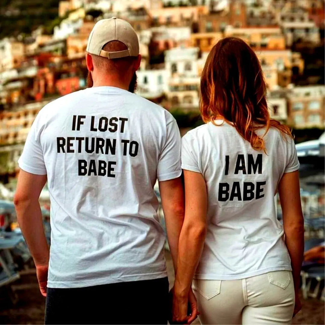 Couples matching white T-shirts from CouplesChoices.com—his says “If Lost Return to Babe,” hers says “I Am Babe.” A fun, romantic way to express loyalty, love, and playful devotion in a relationship.