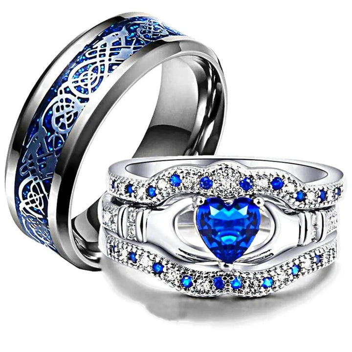 Deep Love Rings by CouplesChoices.com, featuring radiant sapphire-blue stones, Celtic-inspired details, and heart-shaped brilliance—crafted to celebrate powerful, lasting bonds with bold elegance.