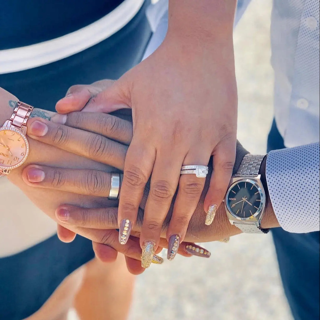 Happy Couples Wearing Matching Rings from CouplesChoices
