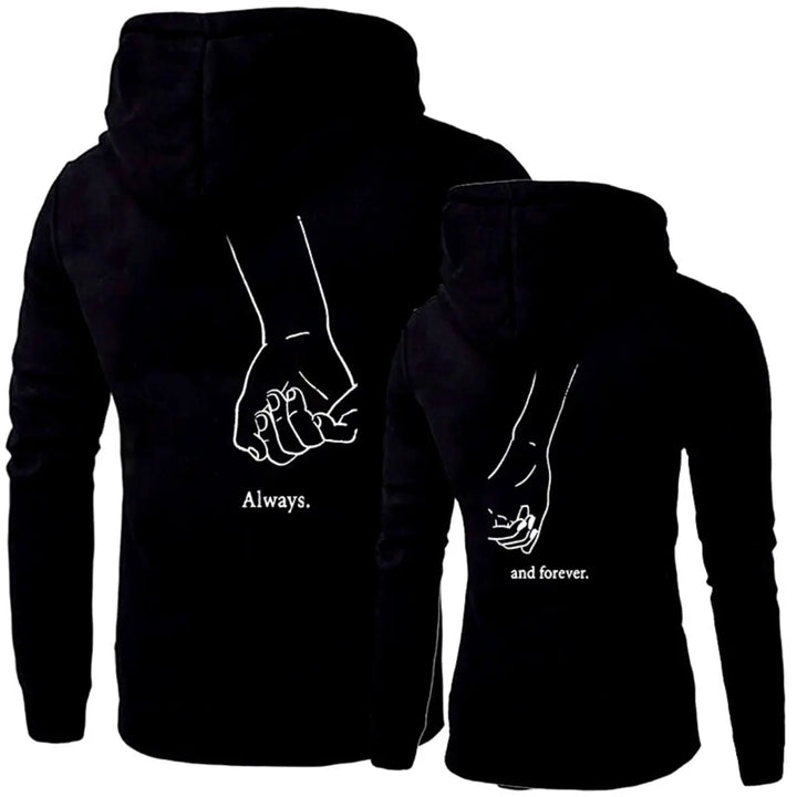 Matching "Always & Forever" couple hoodies in black from CouplesChoices.com, featuring minimalist white line art of intertwined pinkies and romantic typography — the perfect cozy statement for everlasting love and connection.
