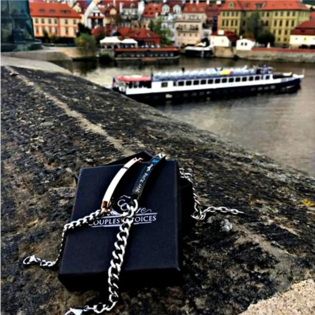 Matching ‘Her King’ and ‘His Queen’ engraved couple bracelets by CouplesChoices.com, featuring crown icons, crystal accents, and durable chain links—symbolizing loyalty, love, and royal connection.