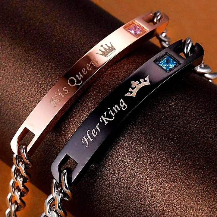 Matching ‘Her King’ and ‘His Queen’ engraved couple bracelets by CouplesChoices.com, featuring crown icons, crystal accents, and durable chain links—symbolizing loyalty, love, and royal connection.