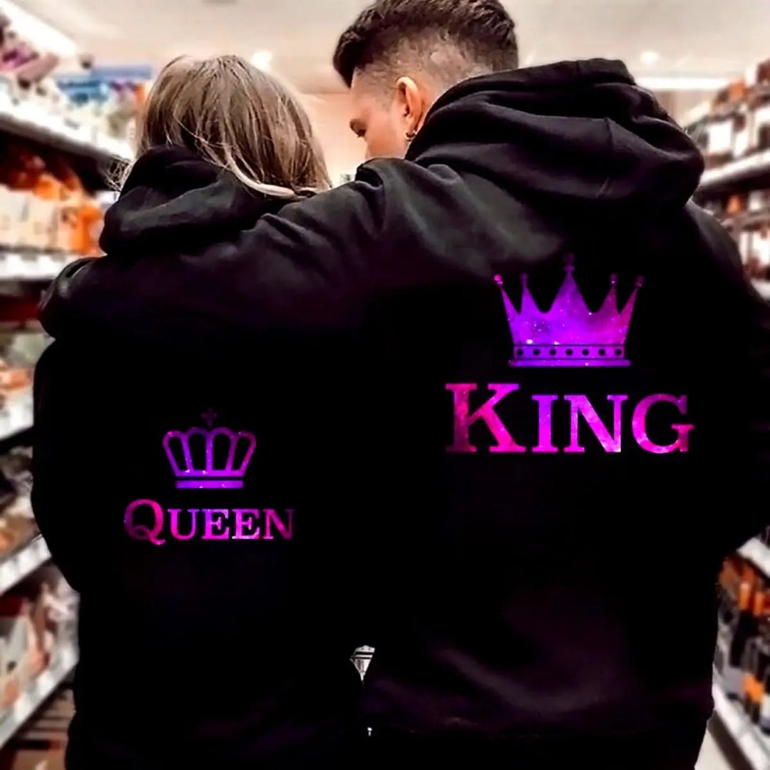 Matching black couple hoodies with vibrant purple crown graphics — “KING” on his and “QUEEN” on hers — from CouplesChoices.com. Stylish, regal loungewear for couples who rule together in love and fashion.